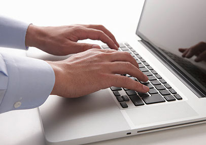 image of hands on laptop computer Via-i Consulting
